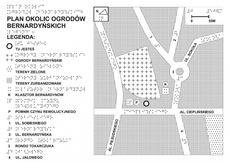 Strona przewodnika po mieście napisany alfabetem Braille?a